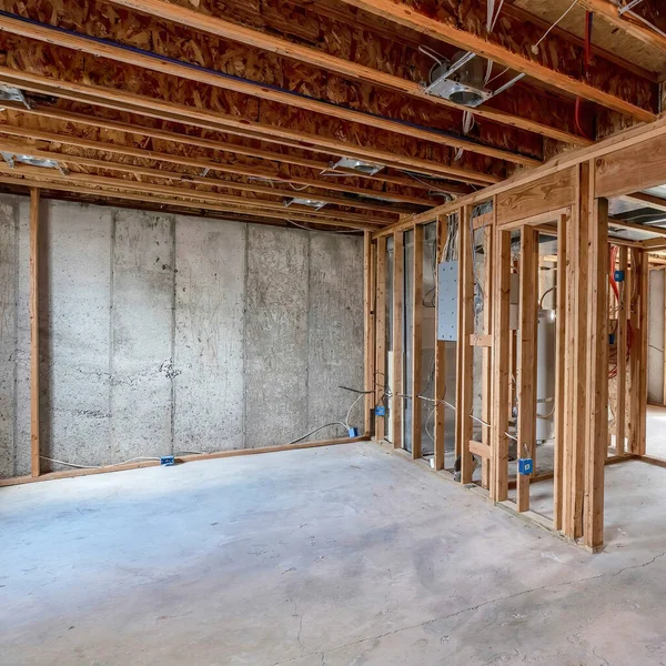 depositphotos_546827046-stock-photo-square-wooden-frameworks-inside-an Electric company wiring a modern kitchen for a new construction electrical system in fresno