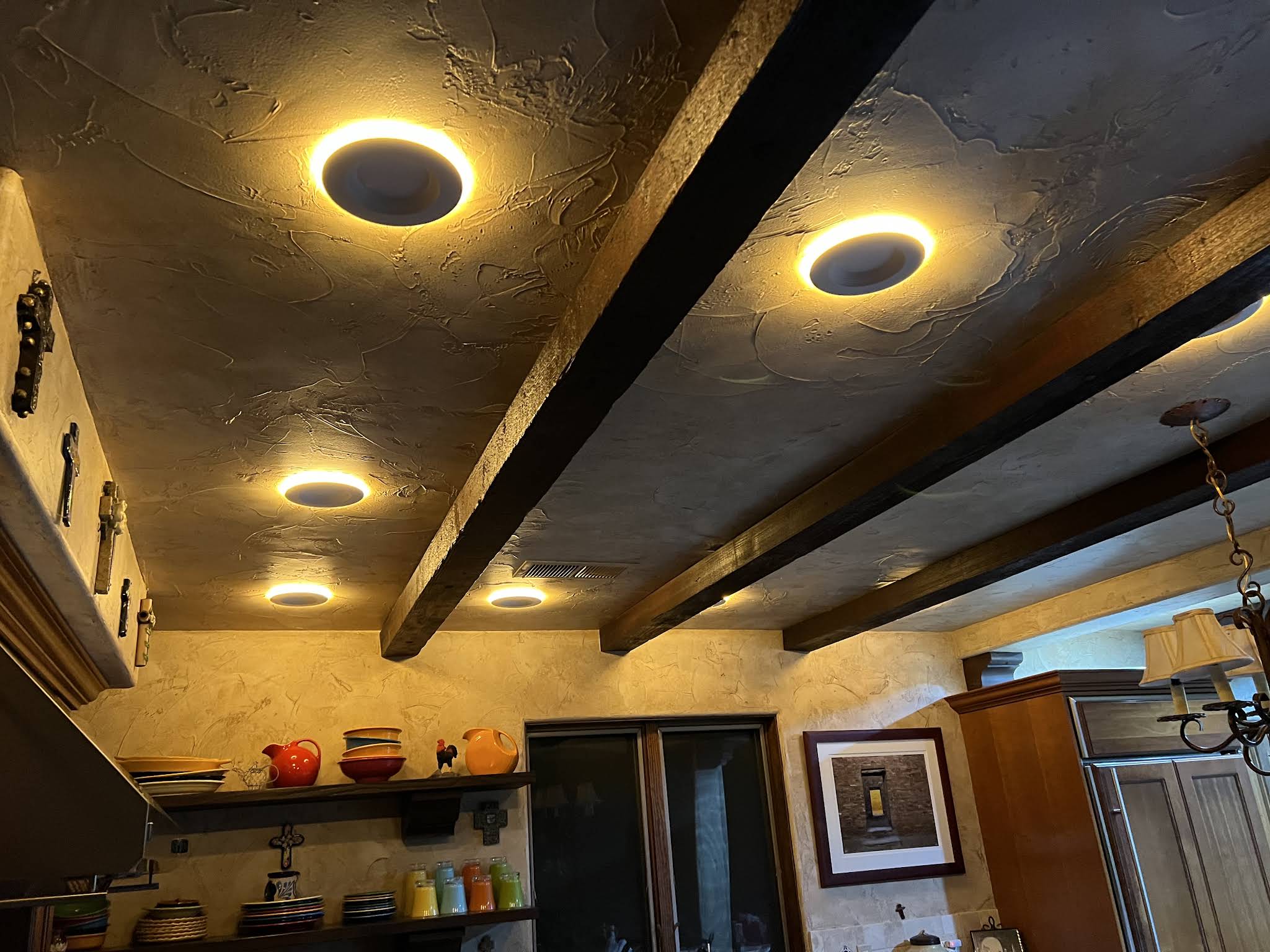 roof led lighting Brightly lit residential living room showcasing modern, energy-efficient LED lighting fixtures and ambiance.